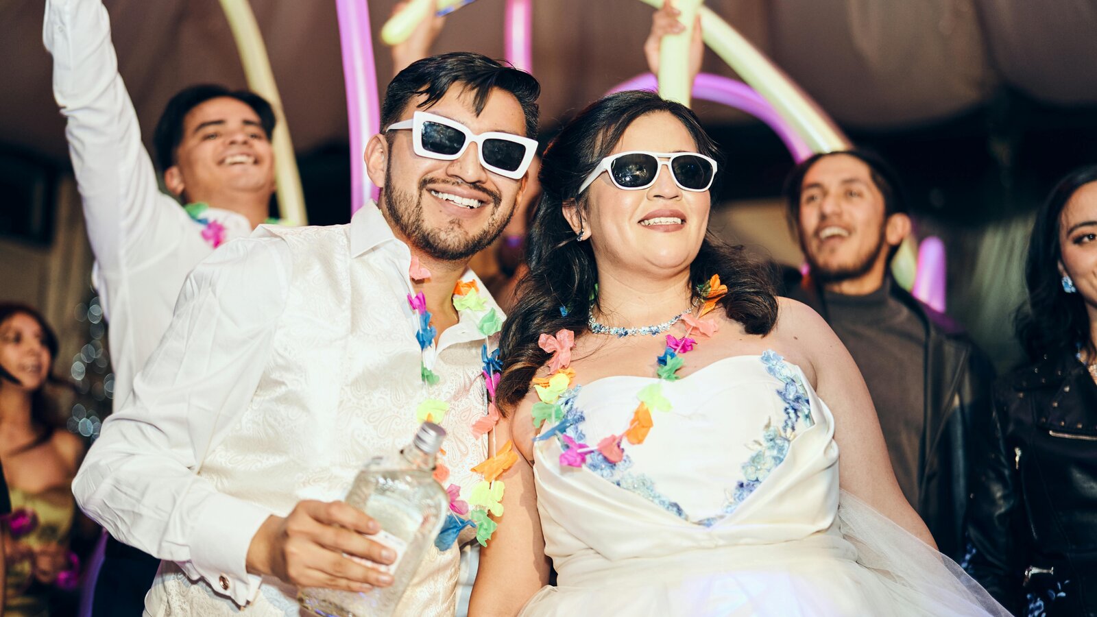 Calgary wedding guests at the photo booth